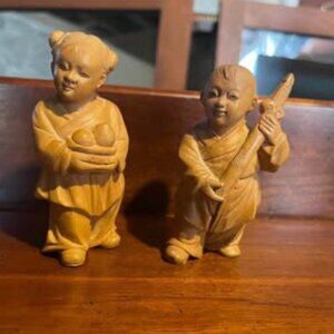 Pair of wooden hand carved Chinese Figurines
